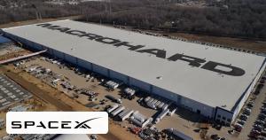 Aerial view of Memphis Colossus 2 with MACROHARD on the roof and a SpaceXAI mark in the corner.