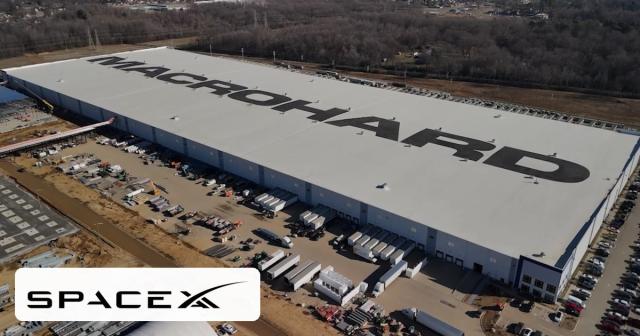 Aerial view of Memphis Colossus 2 with MACROHARD on the roof and a SpaceXAI mark in the corner.